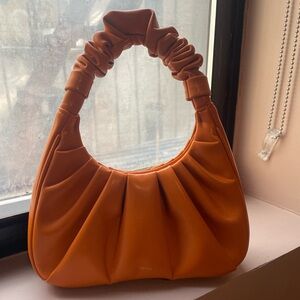 JW PEI Orange Shoulder Bag with Sleek Design